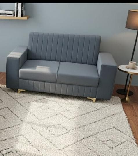 Grey two seater sofa