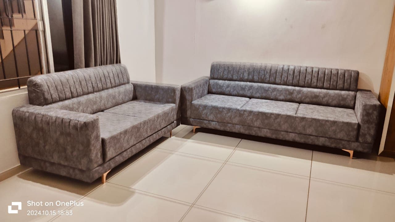 Grey textured 3+2 sofa set delivered to a home
